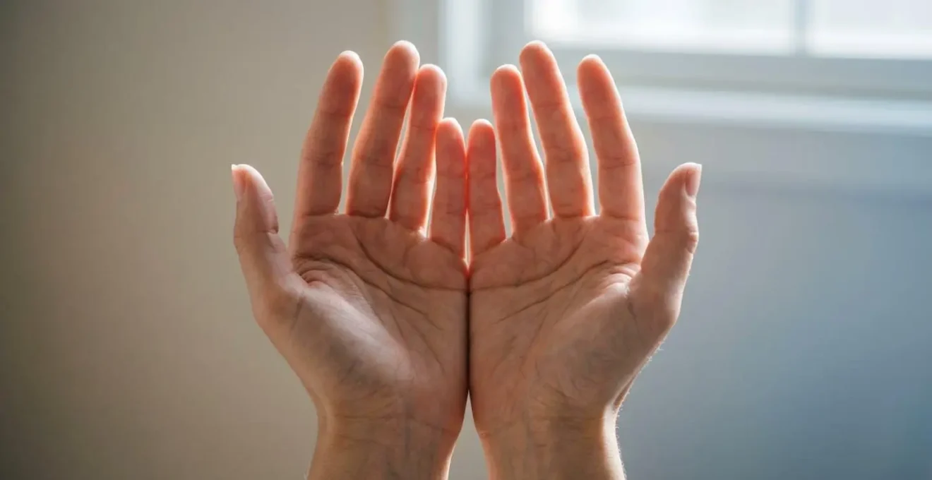 Symbolic image of open palms releasing gentle light representing flexibility and letting go during birth