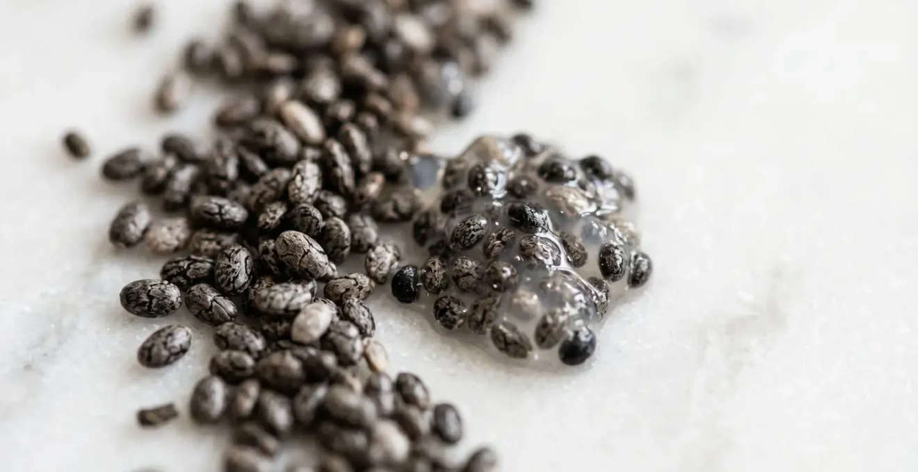 Freshly ground chia seeds showing released oils for omega-3 bioavailability